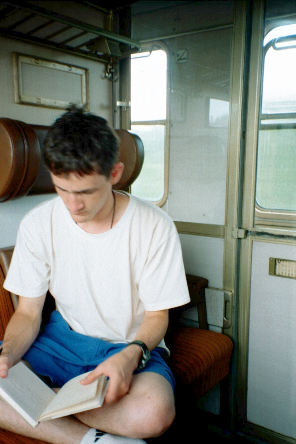 Ryan reading on train to Germany
