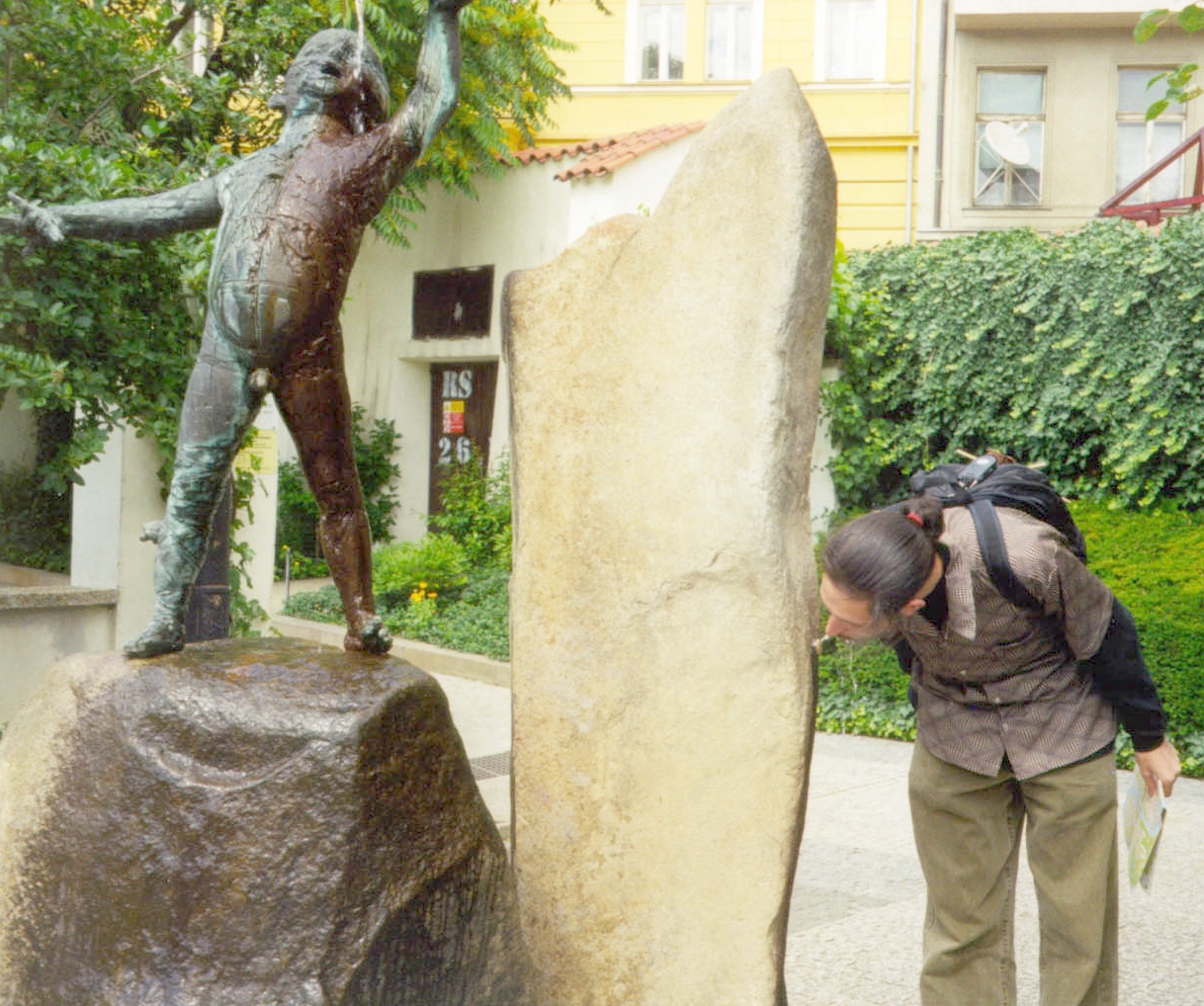 Vince drinking in a rose park in Prauge