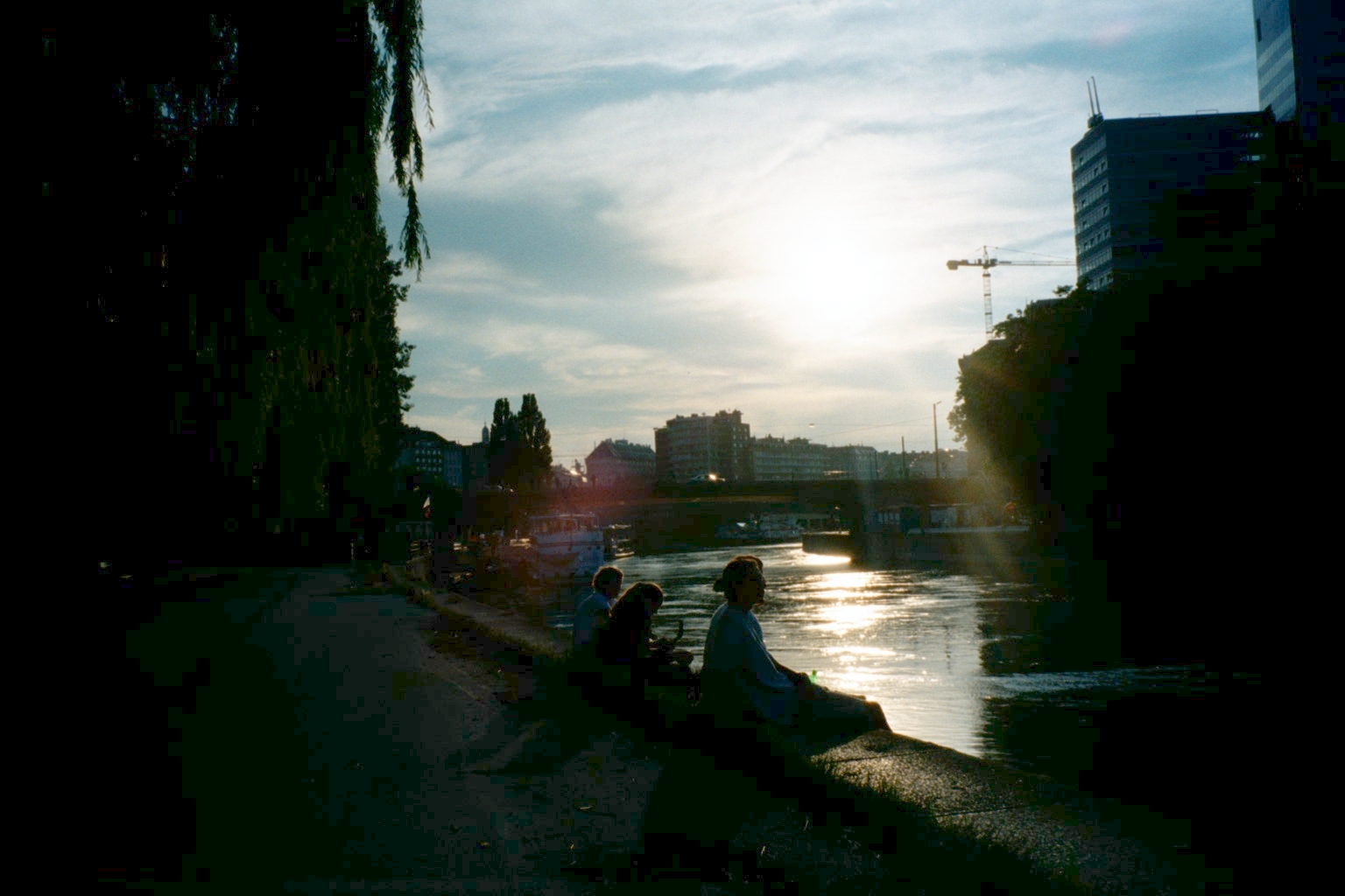 All of us sitting along the Danube in Vienna